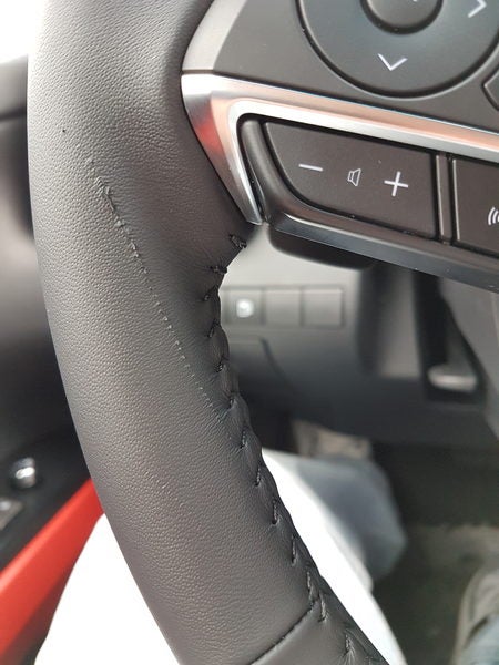 How could I fix a small scratch on leather wrapped steering wheel?