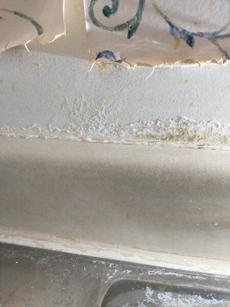 Water damage on drywall behind kitchen sink...Trying to stop worsening ...